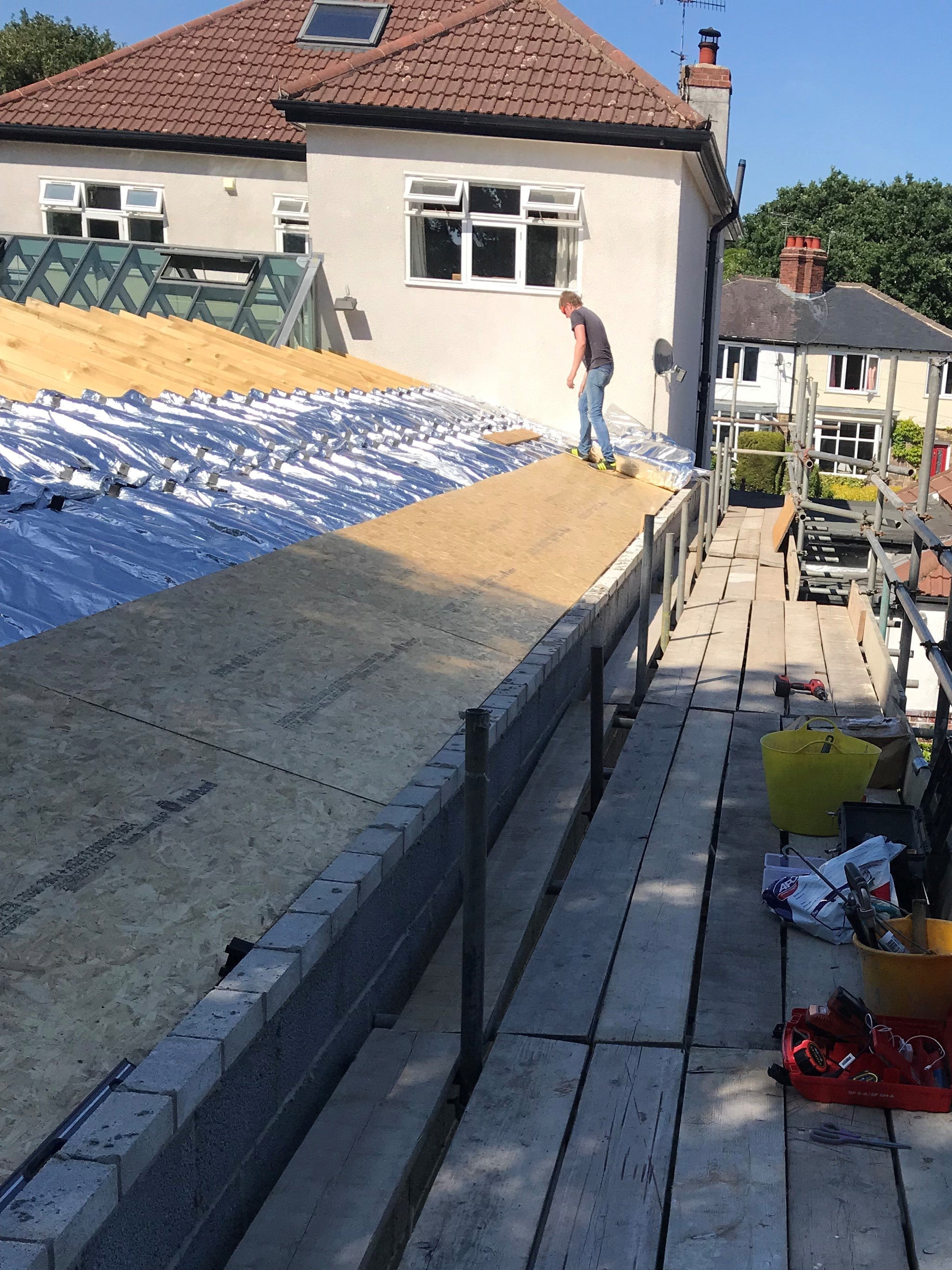 How can I Insulate a Flat Roof with restricted height?